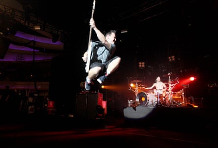 Mark Hoppus performs during the Blink-182 tour at the Hollywood Palladium on 10 October 2009.