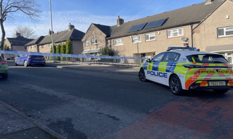 Police at the scene on Walpole Road, Huddersfield. Officers were called to the property after they received a report of concern from the ambulance service.