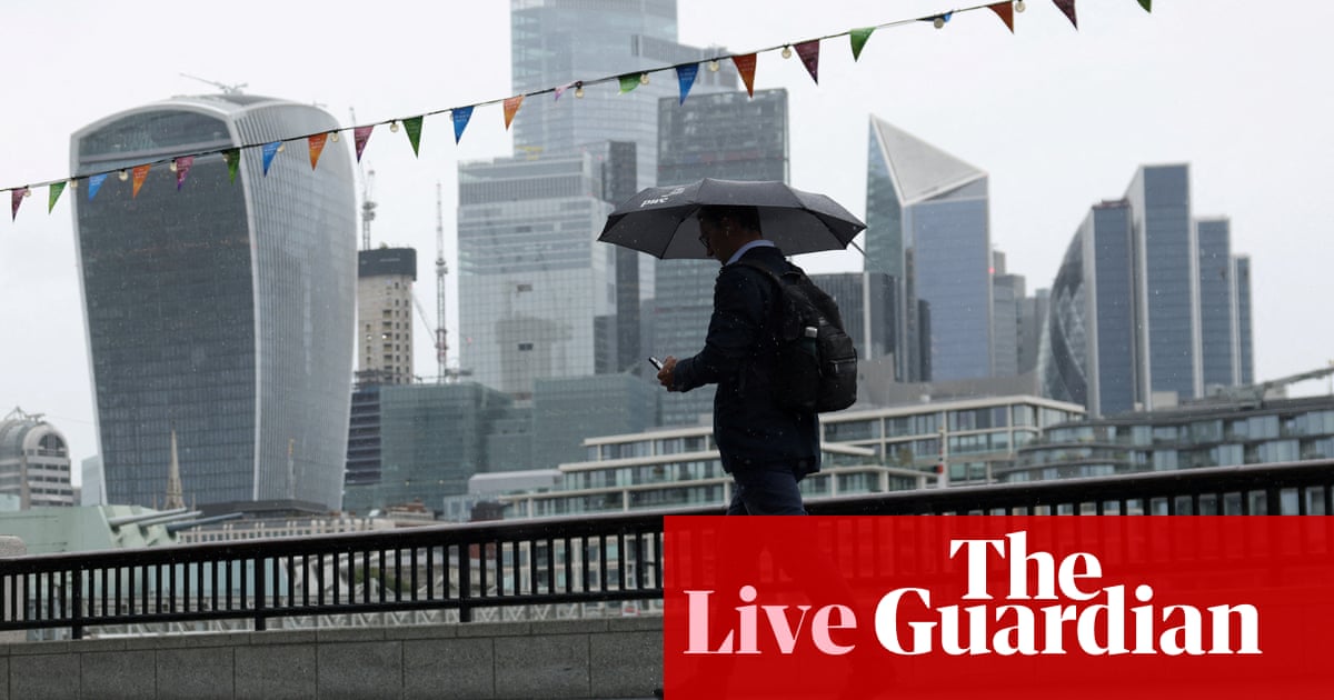 OECD cuts UK growth forecasts; interest rates to remain higher for longer, Fed indicates – business live | Business