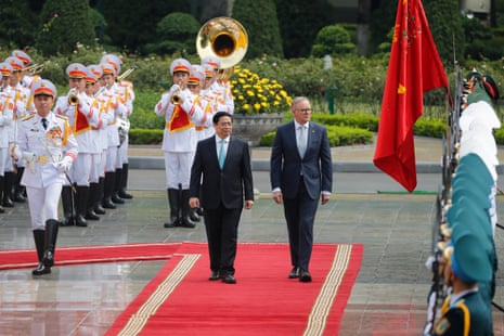 Vietnamese prime minister, Pham Minh Chinh, and Anthony Albanese review the guard of honour at the Presidential Palace in Hanoi, Vietnam.