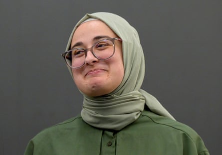 a woman smiles