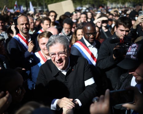 La France Insoumise (LFI) candidate in France's 2027 presidential election Jean-Luc Mélenchon, arrives with LFI's MP Carlos Martens Bilongo, LFI's MP Manuel Bompard, at the start of a demonstration part of a nationwide day of actions in Paris.