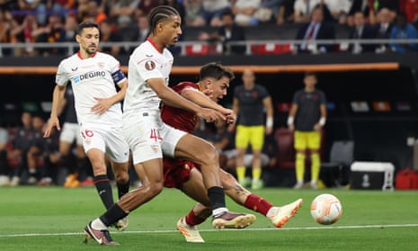 Roma’s Paulo Dybala fires home to open the scoring against Sevilla in the 2023 Europa League final.