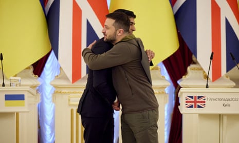 Ukraine’s president, Volodymyr Zelenskiy, embraces the British prime minister, Rishi Sunak.