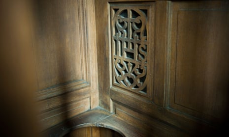 A confession booth in a Catholic church. Traditionally admissions received by priests in confession could not be disclosed if the person was asking for forgiveness.