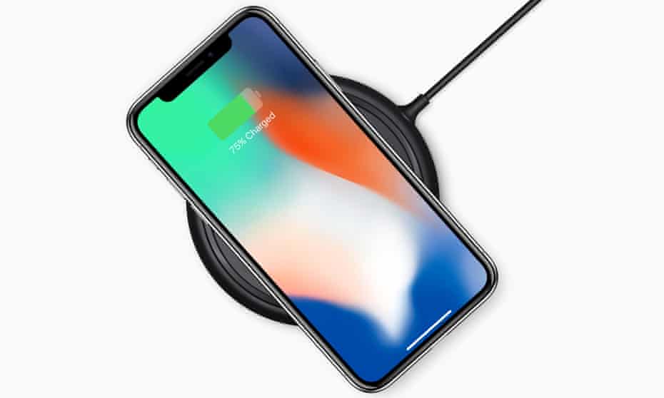 The iPhone X on wireless charger.