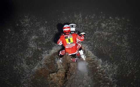 France’s Adrien Van Beveren powers his Yamaha through the water during stage one of the Dakar rally between Asuncion and Resistencia, Argentina.