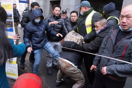 A scuffle between Hong Kong democracy activists and Beijing supporters in Chinatown, London, in November 2021.