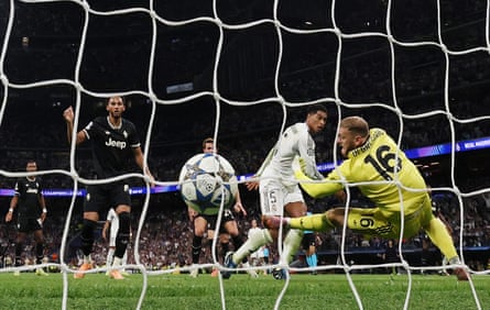 Jude Bellingham tucks the ball home from close range for the only goal of the game in Real Madrid’s victory over Juventus.