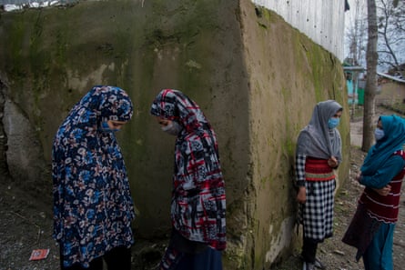 Kashmir. Baramulla. Mubashira talks to her friends while seeing them off after they visited her home. The friendship and the bond they share have brought a new life in them since schools opened again after nearly 18 months. 2021