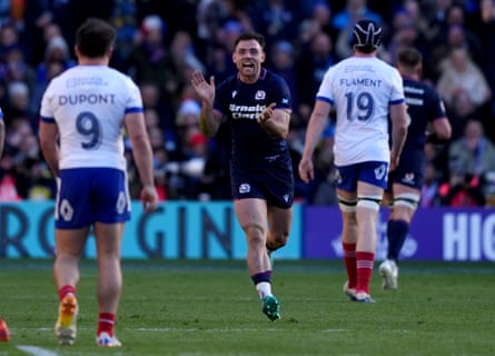 Scotland’s Ben White (centre) applauds in the direction of France’s Antoine Dupont after his side’s fifth try