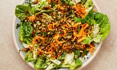 Lettuce with grated carrot on a plate