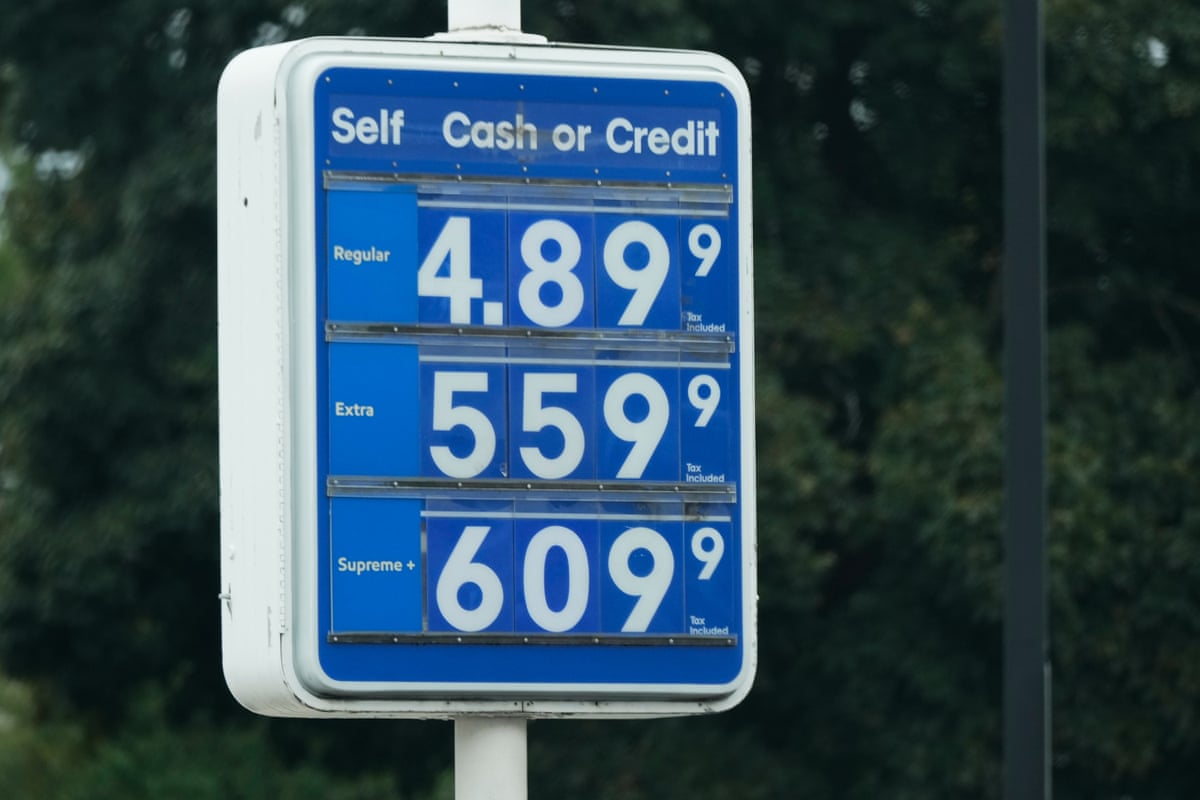 Gas prices are seen at a gas station in Deerfield, Ill.