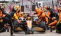 McLaren mechanics work on Oscar Piastri’s car during the Chinese Grand Prix