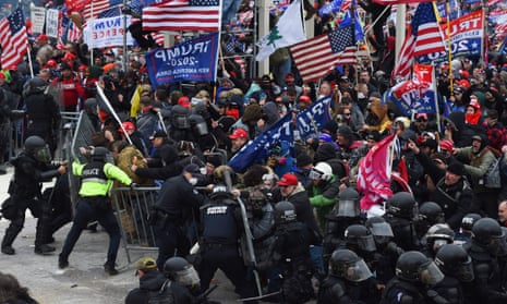 Trump supporters clash with police and security forces at the Capitol in Washington DC on January 6, 2021.