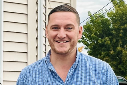 person wearing plaid blue shirt