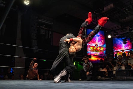 Athletes perform at the 10-year anniversary event for MKW in Beijing on Saturday.