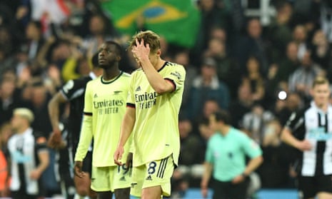Martin Odegaard of Arsenal is dejected after conceding a second goal.