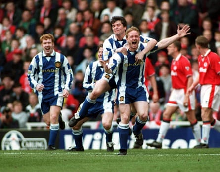 David May (right) is congratulated by a happy Roy Keane as they celebrate alongside Paul Scholes (left) and David Beckham after opening the scoring against Middlesbrough in 1996.