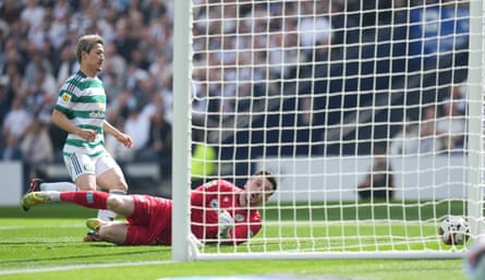 St Mirren goalkeeper Ryan Mullen’s attempted clearance is blocked by Daizen Maeda of Celtic and deflected into the net