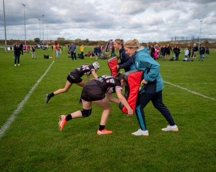 Zoe Aldcroft (second right), and her England teammate Alex Matthews (right), train with Winscombe Warriors at the home of Melksham RFC in Wiltshire.