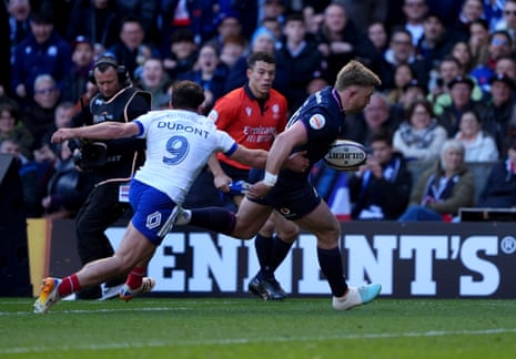 Kyle Steyn (right) runs in to score Scotland’s second try.