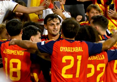 Spain's players celebrate after Pubill (centre) scored the 2-1 goal .