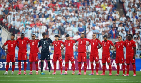 Switzerland players observer a minute’s silence in memory of South African's Jayden Adams