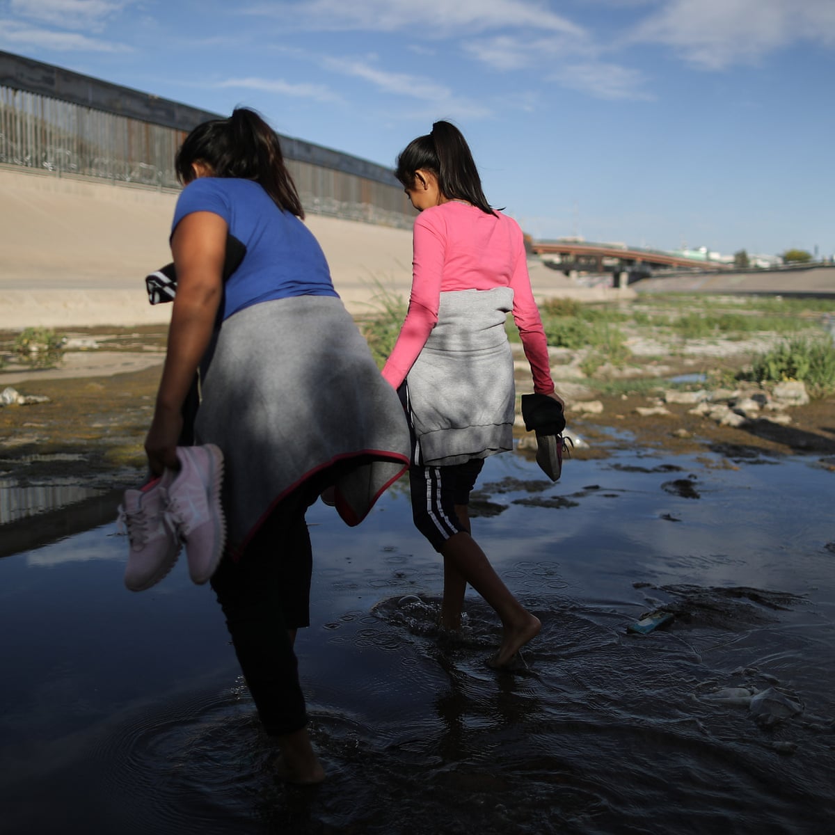 photo Imigrants Crossing The Border the river is treacherous the migrant