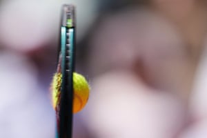 The ball smashes into the strings of Quentin Halys’s racket as he serves to Holger Rune