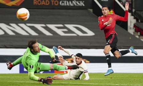 Manchester United’s Mason Greenwood (right) scores his side’s sixth goal