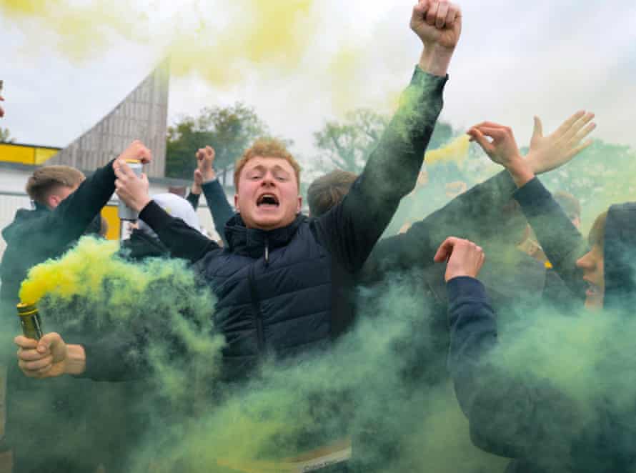 Cambridge fans celebrate promotion to League One last May.