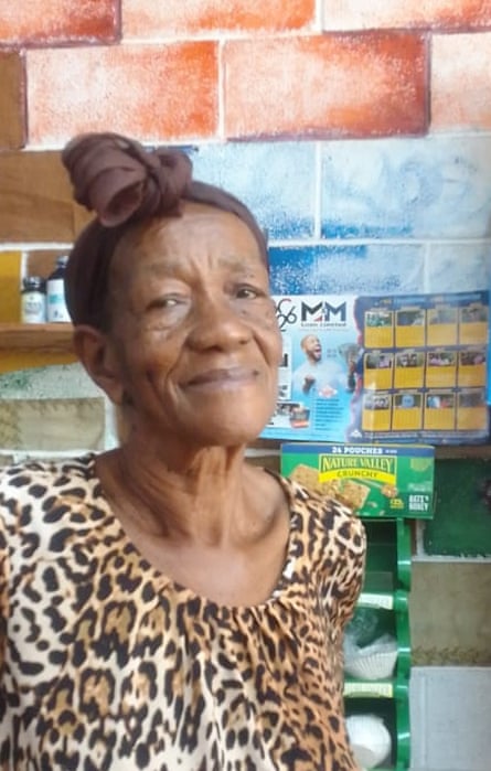 A woman standing inside a shop