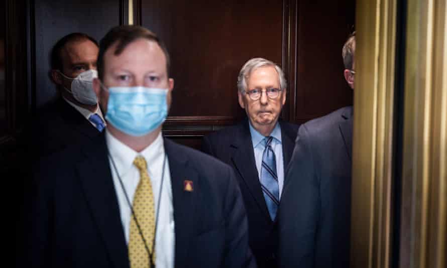 McConnell with others in elevator