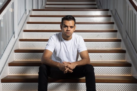 Australian actor, Meyne Wyatt sitting on some steps