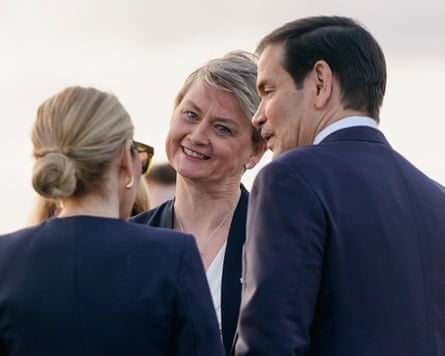 Yvette Cooper greets Marco Rubio and his wife, Jeanette Dousdebes, at Stansted ahead of Donald Trump’s arrival.