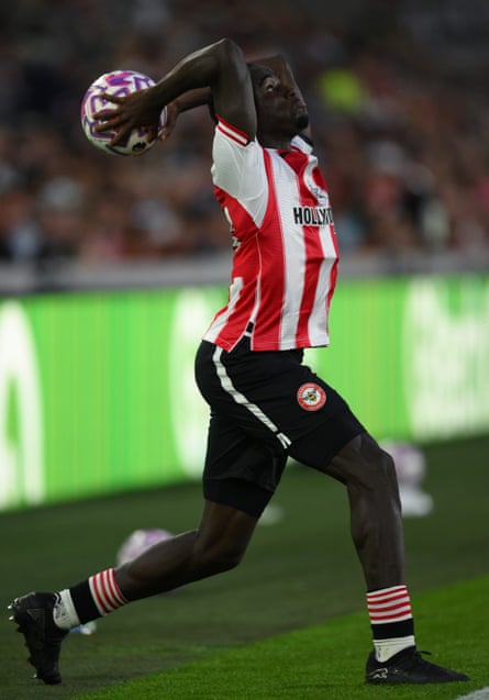 Michael Kayode takes a throw-in during the pre-season friendly match between Brentford and Borussia Mönchengladbach
