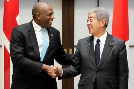 UK foreign secretary David Lammy, left, and Japanese foreign minister Takeshi Iwaya, shake hands prior to a meeting at the foreign ministry’s Iikura Guesthouse in Tokyo, Japan.