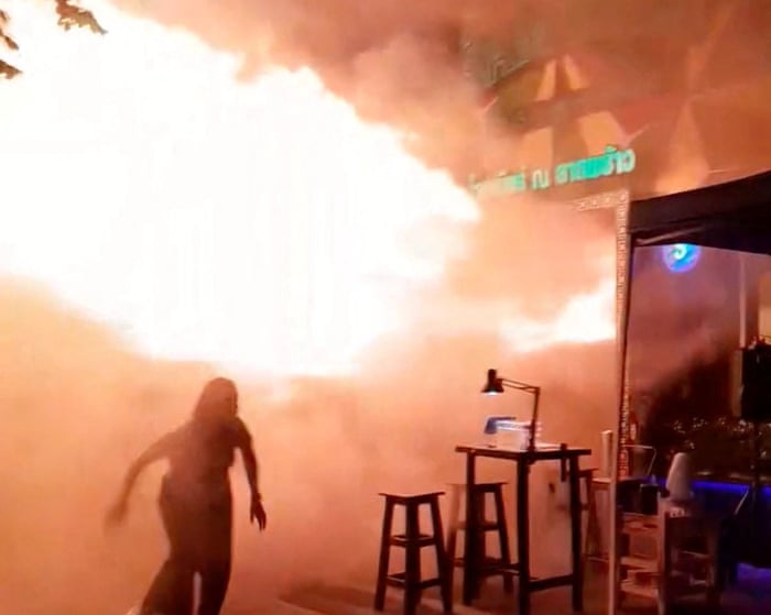 People flee as flames erupt from Bangkok pub fire - video