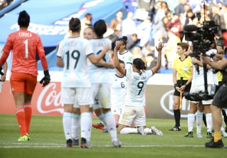 Argentina players celebrate after the final whistle of the 0-0 draw against Japan at Parc des Princes.