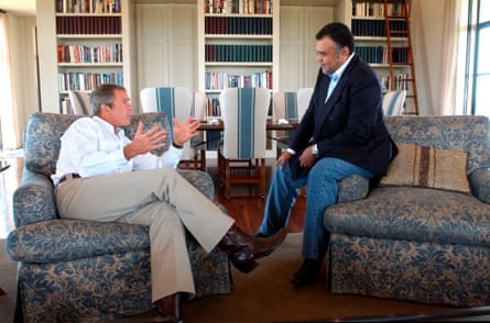 President George W Bush speaks to Saudi ambassador Prince Bandar in Crawford, Texas in 2002.