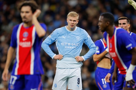 Erling Haaland looks dejected after PSG score the third goal