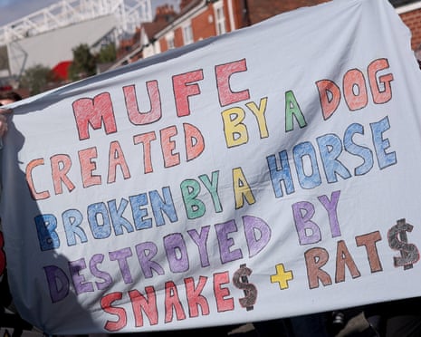 Fans of Manchester United hold up a banner in a protest outside Old Trafford before the Premier League match against Manchester City in September 2026
