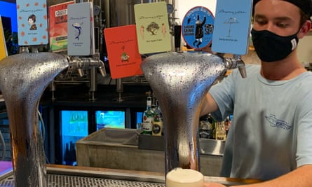 Man pouring beer at Dangerous Ales brewery