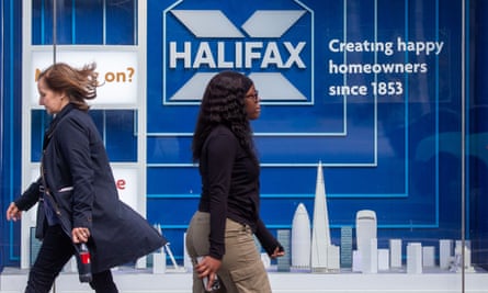 People pass by a Halifax bank branch