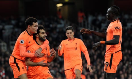 Mohamed Salah, second left, celebrates scoring Liverpool’s second goal with Philippe Coutinho, left, Roberto Firmino and Sadio Mané, right.