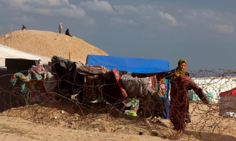  Palestinians at a makeshift camp set up on the beach for people who fled to Rafah in the southern Gaza Strip on 1 February.
