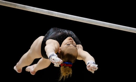 Amy Tinkler takes flight while competing on the uneven bars at the 2018 World Cup