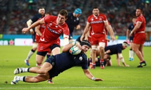 George Turner of Scotland scores his team’s fifth try.