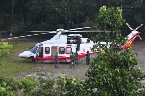 Nepali soldiers prepare a helicopter for morning rescue sorties.